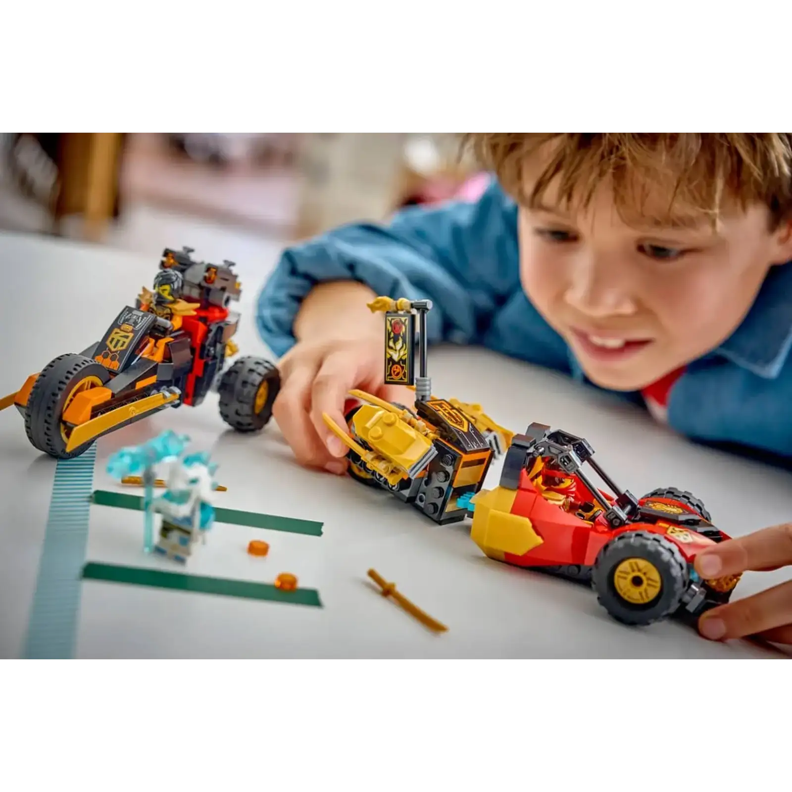 Конструктор LEGO NINJAGO Комбинированные транспортные средства Кая и Коула (71864)