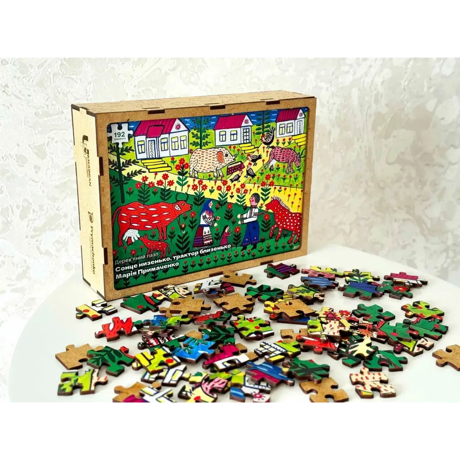 Пазл дерев`яний UkrainianPuzzles Сонце низенько, трактор близенько Марія Примаченко UA