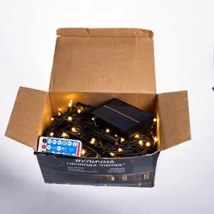 Новогодняя гирлянда уличная 100 м 1000 LED с солнечной батареей 8 режимов работы черный провод Желтый свет SB1000L100MBY Garlando UA