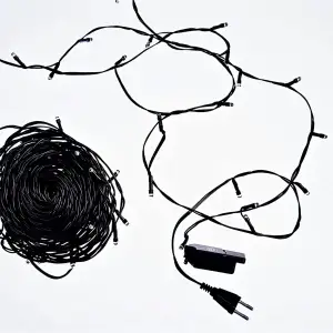 Новогодняя гирлянда комнатная нить 18 м 180 LED комнатная гирлянда черный провод Белый свет W180LED18MBW Garlando UA
